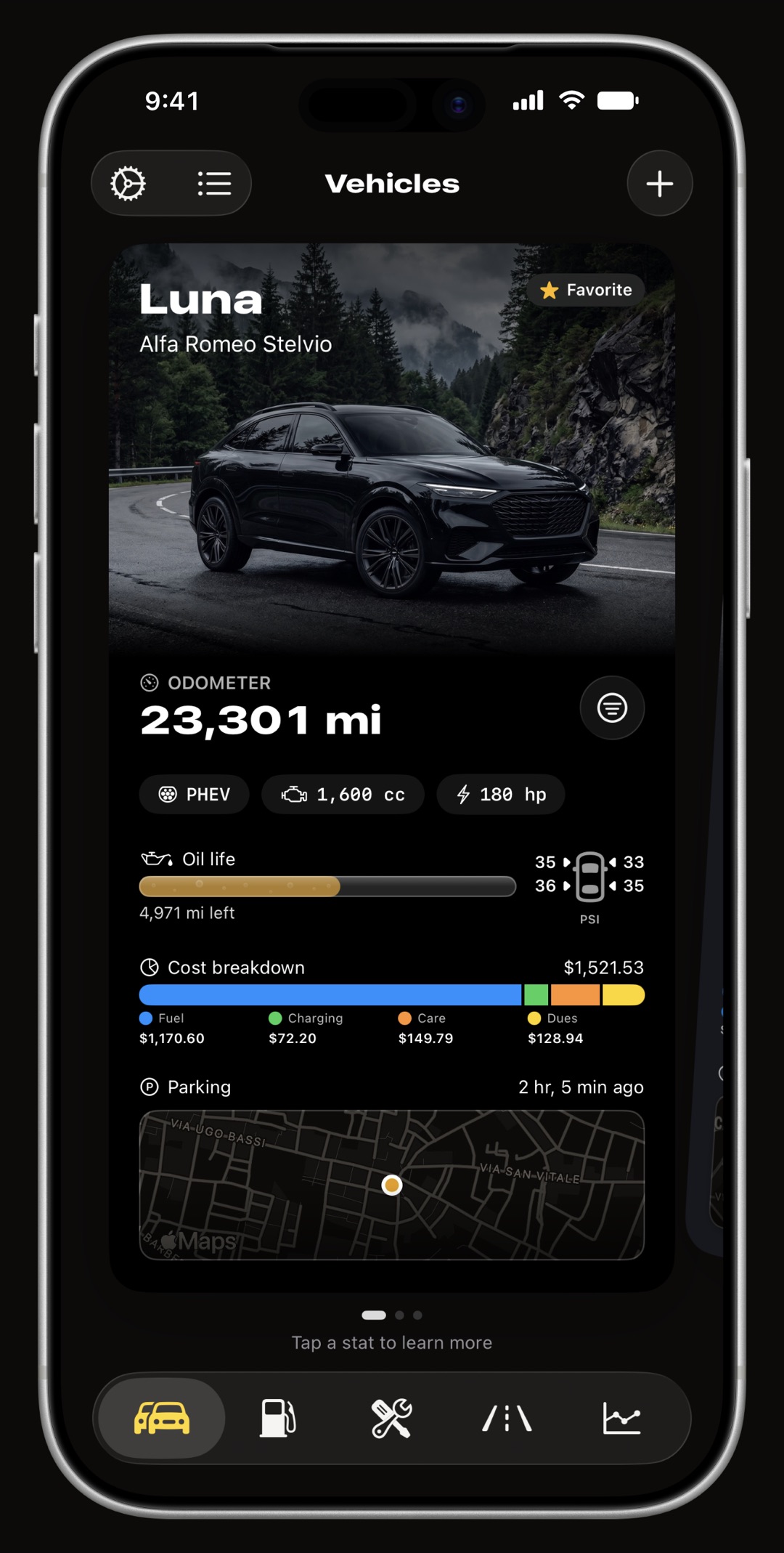 WrenchTime vehicle card on iPhone showing odometer, oil life, tire pressure, cost breakdown and parking spot