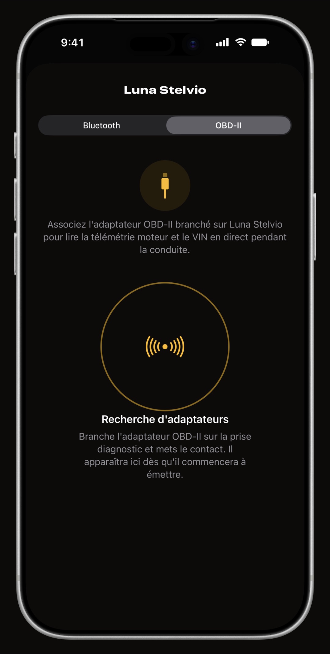 Écran d'association de WrenchTime sur iPhone, sur son onglet OBD-II, à la recherche d'un adaptateur branché sur la prise diagnostic du véhicule
